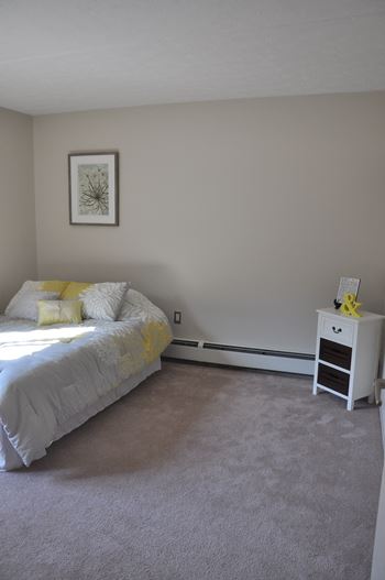 Bedroom with carpeting